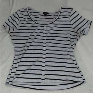 Stripped, form fitting top, faux buttons